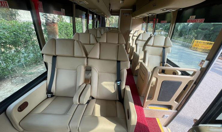 14 seater sml isuzu luxury coach with toilet washroom fridge tv hire delhi